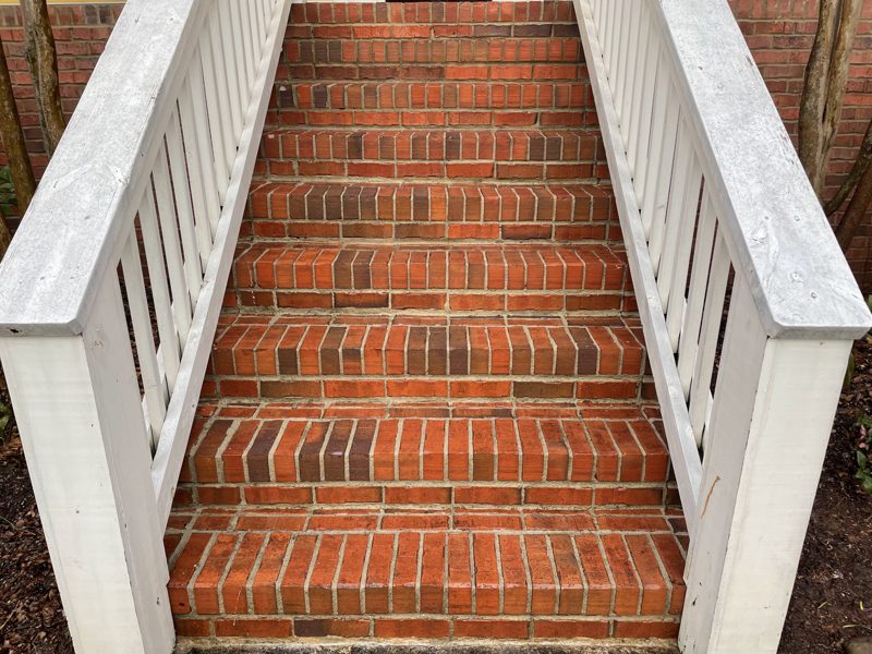 The same brick stair after cleaning, mortar and brick color returned